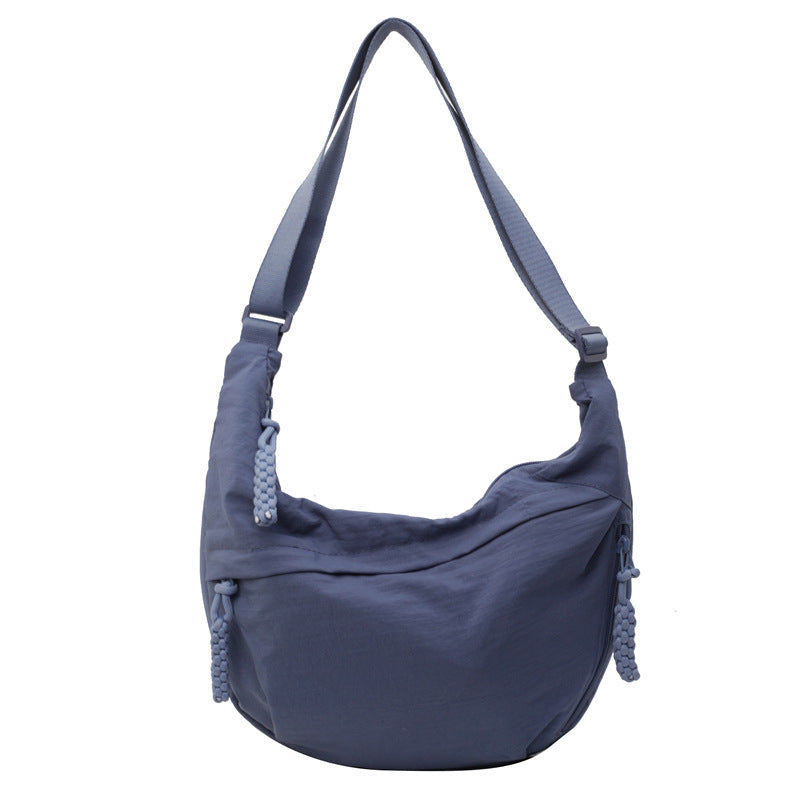 KHANYA | MULTI-ZIP SLING BAG
